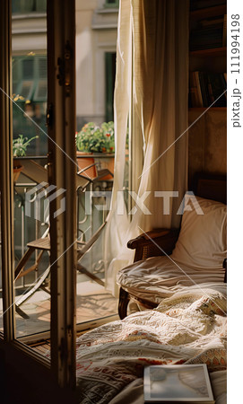 Luxury hotel room interior with big window, sofa and books 111994198