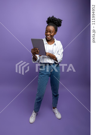 Smiling cute dark-skinned woman generating new ideas Smiling cute dark-skinned woman generating new ideas 111994952