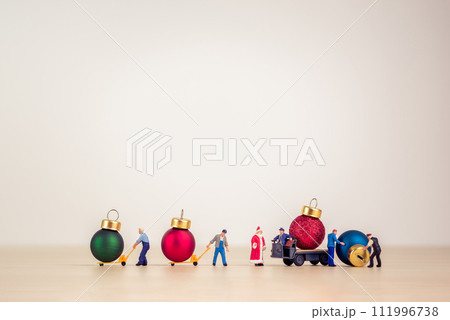 Toy truck carries Christmas decorative balls Toy truck carries Christmas decorative balls 111996738