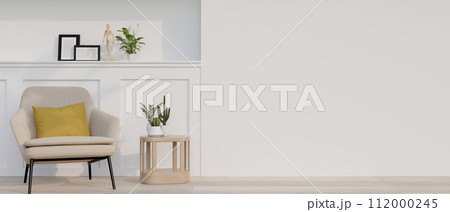 A contemporary home corridor features an armchair, a side table, a white wall, and parquet flooring. 112000245