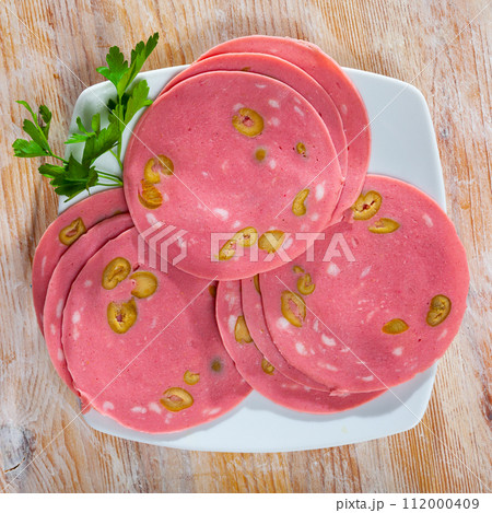 Mortadella sausage with olives Mortadella sausage with olives 112000409