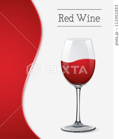 red wine glass on grey background 112002883