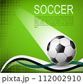 soccer ball on green background with black halftones 112002910