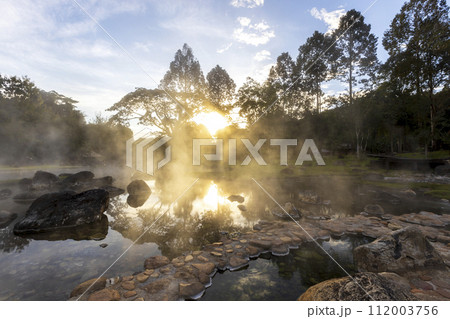 Hot springs and fog in Thailand with sunlight at morning 112003756