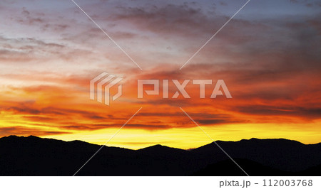 colorful dramatic sky with cloud at sunset colorful dramatic sky with cloud at sunset 112003768