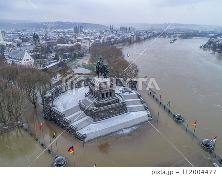 Flooding high water Koblenz Germany historic monument German Corner winter where rivers rhine and mosele flow together 112004477