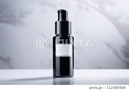 Black and white bottles for cosmetics and personal skin care products are arranged in a row. Empty label template mock up. Blank packaging on a marble white background. Front view. Containers set 112006906