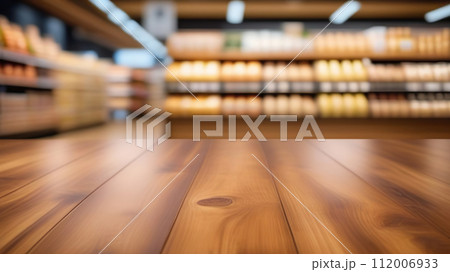 Empty table top with supermarket blurred defocused panorama, bokeh light. Backdrop for display or montage products. Blank wood textured counter with blur grocery, market store background. Front view 112006933