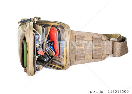 Backpack bag gear protective color khaki, tactical sports equipment isolated on white background Backpack bag gear protective color khaki, tactical sports equipment isolated on white background 112012500