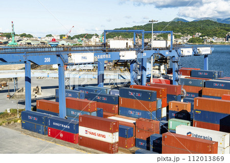 Panoramic view of the container yard and crane equipment at Port of Keelung, Taiwan. It's an international logistics company. Panoramic view of the container yard and crane equipment at Port of Keelung, Taiwan. It's an international logistics company. 112013869