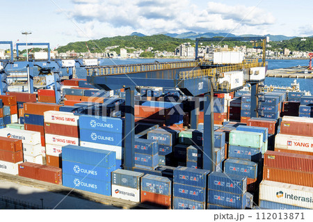 Panoramic view of the container yard and crane equipment at Port of Keelung, Taiwan. It's an international logistics company. Panoramic view of the container yard and crane equipment at Port of Keelung, Taiwan. It's an international logistics company. 112013871