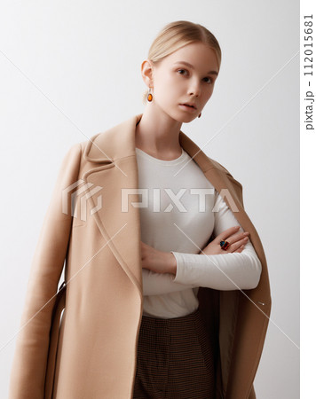 Portrait of young beautiful girl wearing stylish Portrait of young beautiful girl wearing stylish 112015681