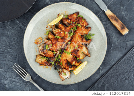 Fried or baked mackerel. 112017814