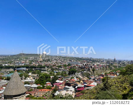 Beautiful landscape panorama of city Tbilisi with hot air balloon on the background of sky 112018272