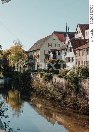 Old national German town house in Bietigheim-Bissingen, Baden-Wuerttemberg, Germany, Europe. Old Town is full of colorful and well preserved buildings. Old national German town house in Bietigheim-Bissingen, Baden-Wuerttemberg, Germany, Europe. Old Town is full of colorful and well preserved buildings. 112018709