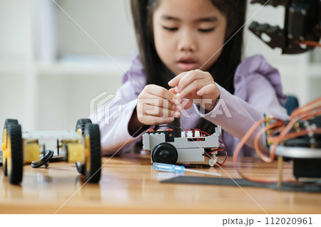STEM education concept. Asian young girl learning robot design. STEM education concept. Asian young girl learning robot design. 112020961