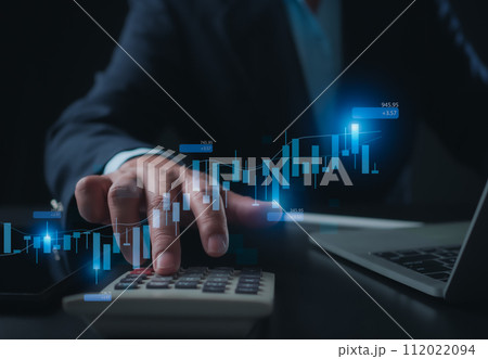 Stock market, Business growth, progress or success concept. Businessman or trader is showing a growing virtual hologram stock, invest in trading. Stock market, Business growth, progress or success concept. Businessman or trader is showing a growing virtual hologram stock, invest in trading. 112022094