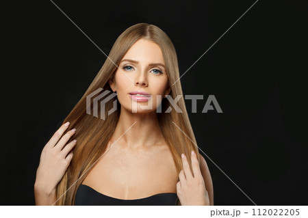 Beautiful young woman with long hair Beautiful young woman with long hair 112022205