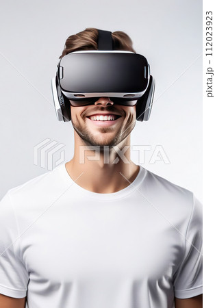 Portrait of young smiling European man wearing virtual reality glasses. Vr headset. Portrait of young smiling European man wearing virtual reality glasses. Vr headset. 112023923