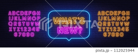 What s New neon sign in the speech bubble on brick wall background. What s New neon sign in the speech bubble on brick wall background. 112025944