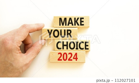 Make your choice 2024 symbol. Concept words Make your choice 2024 on beautiful wooden block. Beautiful white table white background. Voter hand. Business Make your choice 2024 concept. Copy space. Make your choice 2024 symbol. Concept words Make your choice 2024 on beautiful wooden block. Beautiful white table white background. Voter hand. Business Make your choice 2024 concept. Copy space. 112027101