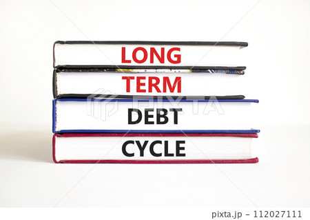 Long term debt cycle symbol. Concept words Long term debt cycle on beautiful books. Beautiful white table white background. Business Long term debt cycle concept. Copy space. 112027111