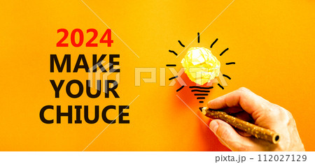 2024 Make your choice symbol. Concept words 2024 Make your choice on beautiful orange paper. Beautiful orange background. Light bulb icon. Voter hand. Business 2024 Make your choice concept Copy space 2024 Make your choice symbol. Concept words 2024 Make your choice on beautiful orange paper. Beautiful orange background. Light bulb icon. Voter hand. Business 2024 Make your choice concept Copy space 112027129