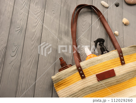 beachwear bag sun protection sunglasses sunscreen spray lotion cream care tan ultra-violet rays 112029260