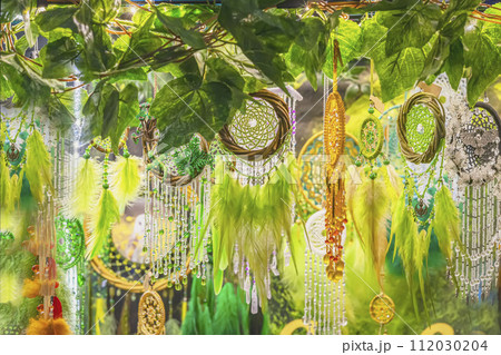 Various decorations, pendants and jewelry in green for holiday, celebrating St. Patrick's Day 112030204