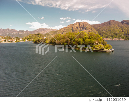 Aerial panoramic view over beautiful lake Como between Italy and Switzerland. Aerial panoramic view over beautiful lake Como between Italy and Switzerland. 112031089