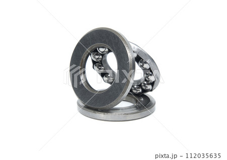 Thrust ball bearing isolated on white background Thrust ball bearing isolated on white background 112035635