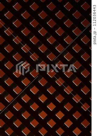 Abstract background with wooden grid on a colored dark background 112036443