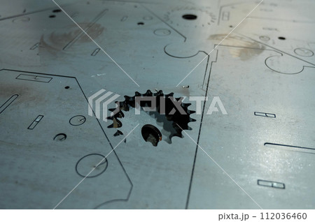 Laser cutting of metal on a CNC machine. Laser cutting of metal on a CNC machine. 112036460
