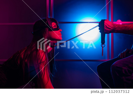 A woman is kneeling in front of a man. Role-playing games. 112037312