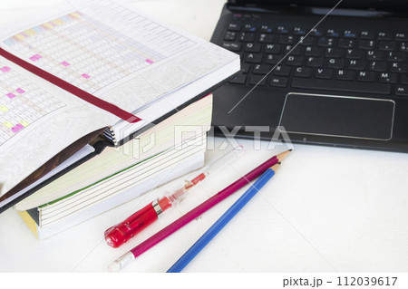 notebook planner with computer for business work notebook planner with computer for business work 112039617