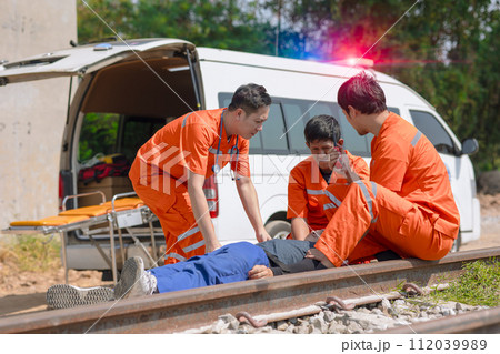 paramedic,medical,emergency,doctor,team,working,in,action,help,first,aid,save,people,life,at,accident,site,outdoors paramedic,medical,emergency,doctor,team,working,in,action,help,first,aid,save,people,life,at,accident,site,outdoors 112039989