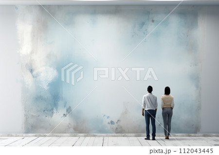 Engaged audience. men and women focusing on empty wall space, anticipating words to fill the void 112043445