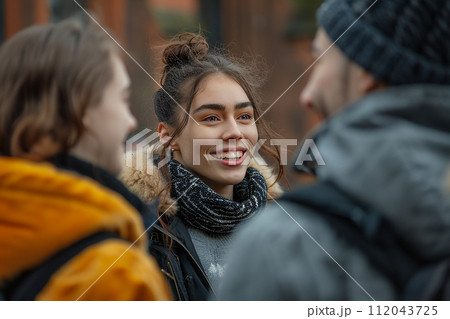 Cheerful Portrait of female student talking with university friends. 112043725
