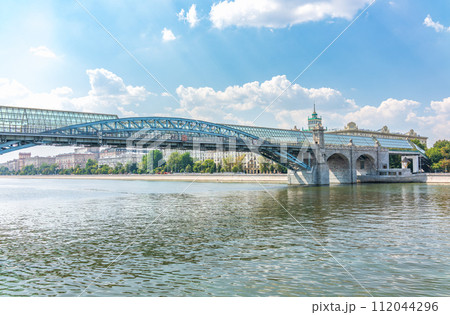 View of the Moscow river embakment, Pushkinsky bridge and cruise ships at sunset. View of the Moscow river embakment, Pushkinsky bridge and cruise ships at sunset. 112044296