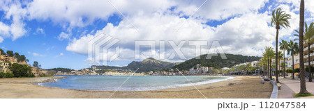 Panoramic View of the Tranquil Beach and Promenade in Port de Soller, Mallorca 112047584
