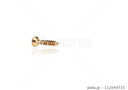 macro screw of golden color on a white background 112049715