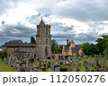 View on old church and cemetery in Stirling, Scotland, Great Britain under the dark sky. 112050276