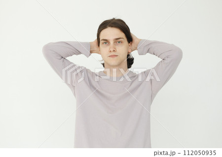 Solve a problem concept. Handsome guy on white background 112050935