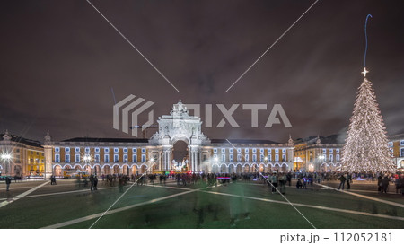 Panorama showing Commerce square illuminated and decorated at Christmas time in Lisbon night timelapse. Portugal Panorama showing Commerce square illuminated and decorated at Christmas time in Lisbon night timelapse. Portugal 112052181