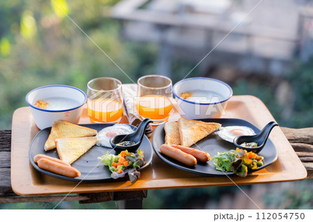 amrican breakfast serve with boiled rice,breakfast 112054750