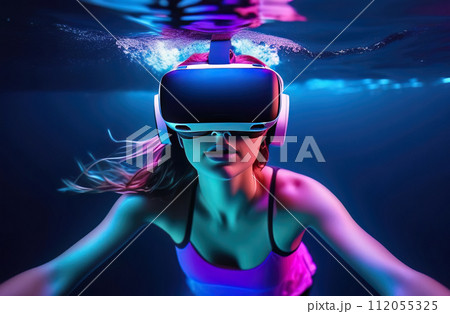 Young woman wearing virtual reality glasses under the water. Concept of dive into the Metaverse. 112055325