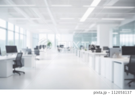 Blurred empty modern office. Defocused abstract light bokeh business eco open space interior background design. Corporate strategy, finance, operations, marketing. Tables with computers blur focus 112058137