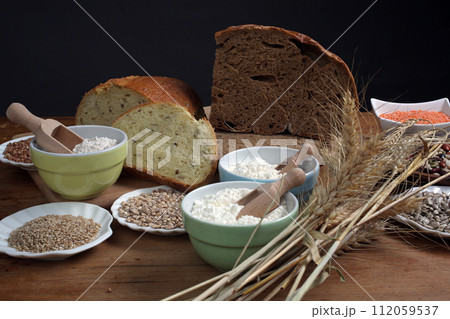 Ingredients for whole grain healthy bread, whole wheat flour Ingredients for whole grain healthy bread, whole wheat flour 112059537