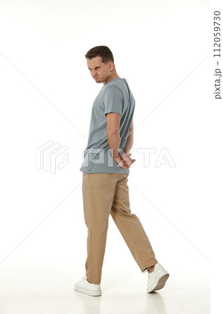 offended frustrated young man on white background. sadness offended frustrated young man on white background. sadness 112059730