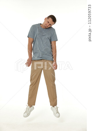 offended frustrated young man on white background. sadness 112059733